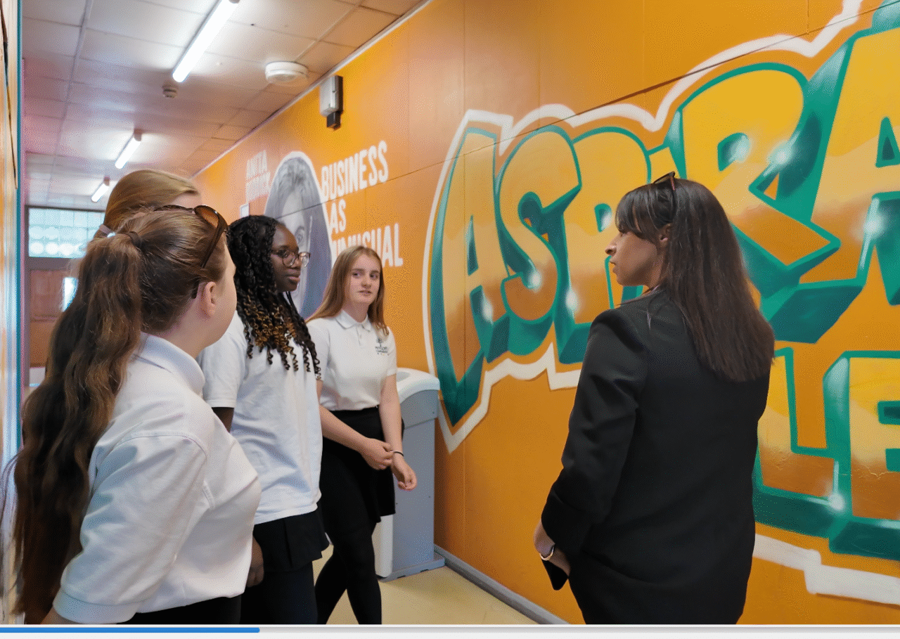 Commissioner Emma Wools speaking with pupils