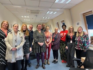 The photo show the Director of Justice, the Chief Executive of Victim Support and members of the Victim Focus team during their recent visit.